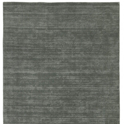 Geweven wollen vloerkleed glossy Lot Petrol