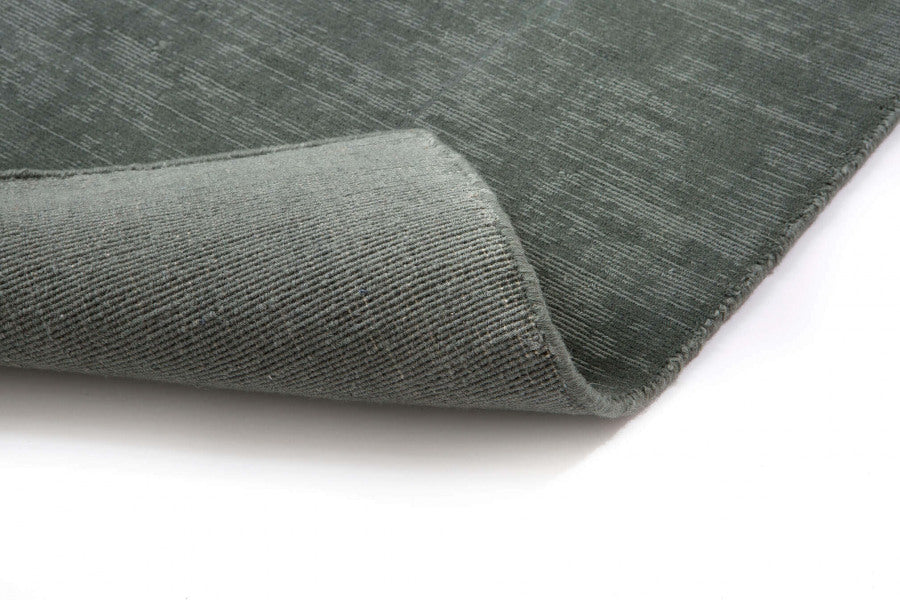 Geweven wollen vloerkleed glossy Lot Petrol detail