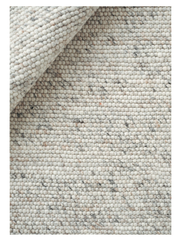 Handgeweven Wollen vloerkleed Ankie Beige close-up 1