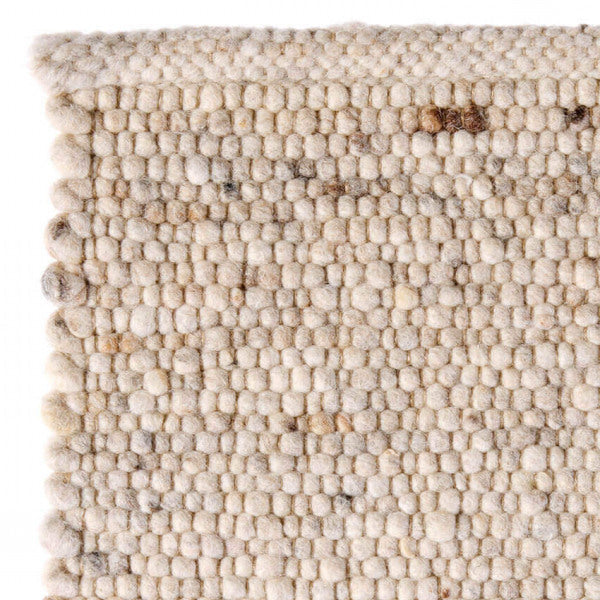 Handgeweven wollen vloerkleed Nanda Lichtbeige 01