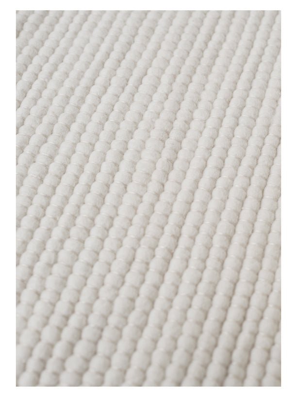 Rond handgeweven wollen vloerkleed Ankie white close-up