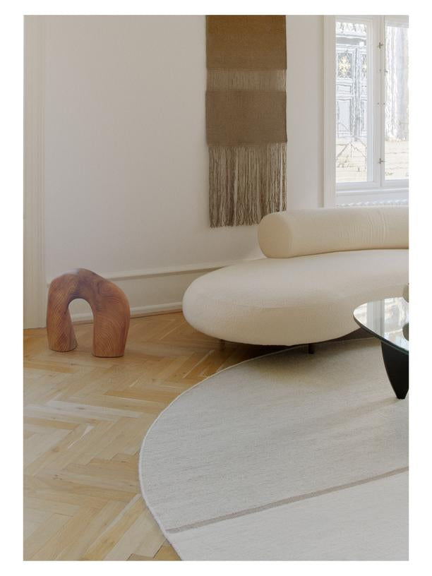 Rond wollen vloerkleed Mila Beige interieur