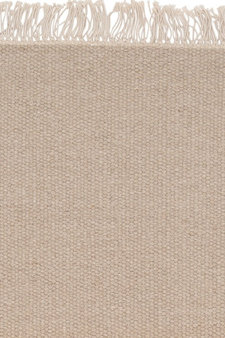 Wollen vloerkleed hip met flosjes Robijn Sand detail