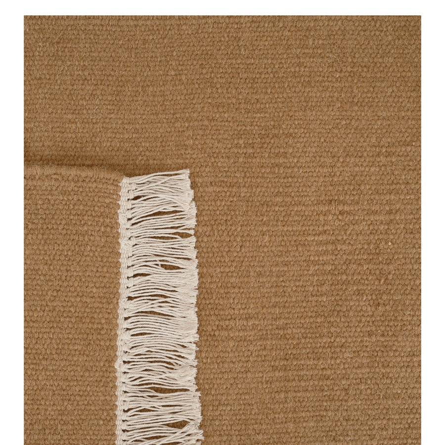 Wollen vloerkleed hip met flosjes Robijn Terracotta detail