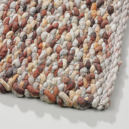 Grof handgeweven wollen vloerkleed Karlijn Mix Roest detail