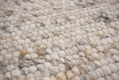 Handgeweven Wollen vloerkleed Ankie Beige close-up