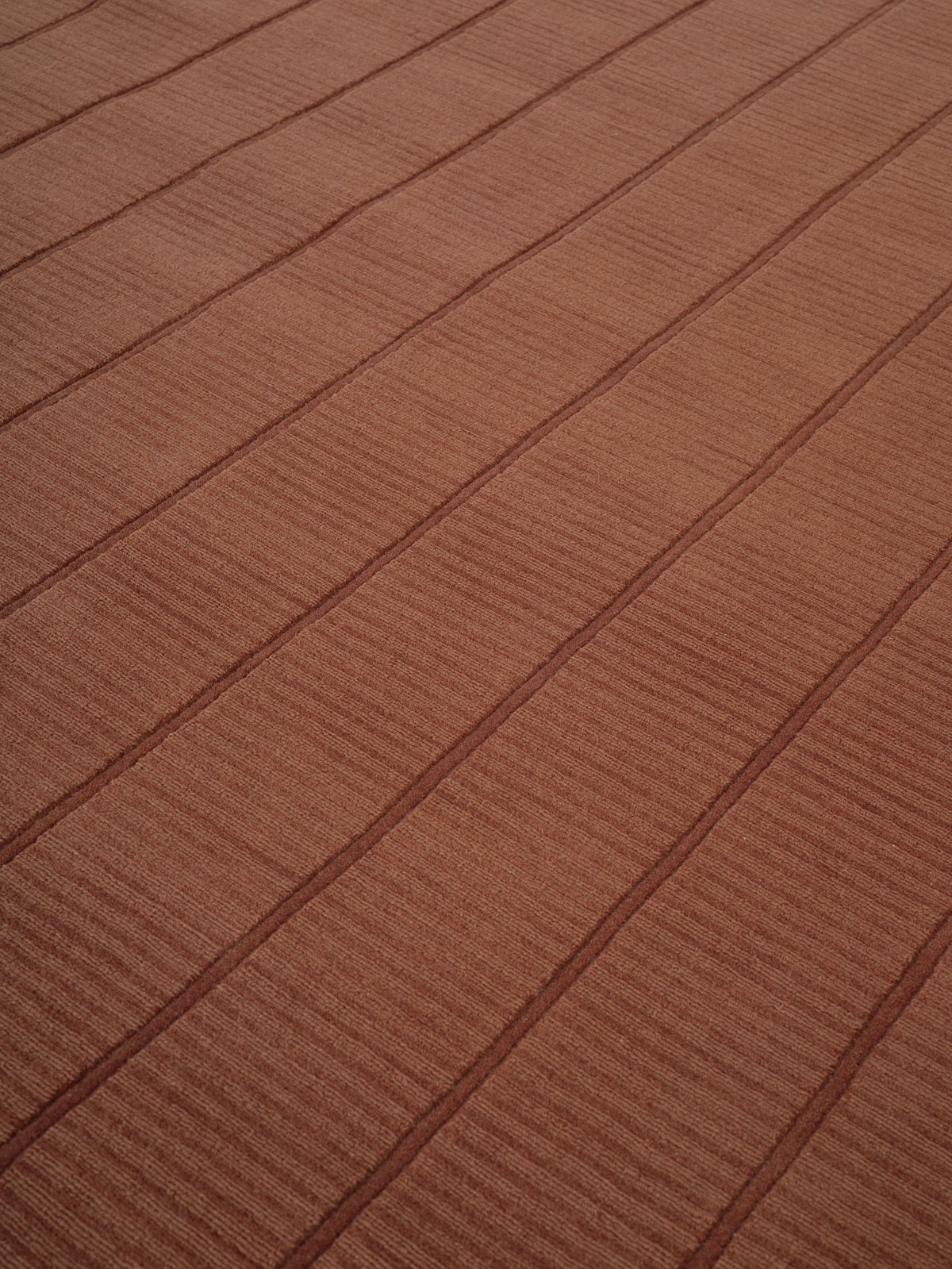 Kaatz Japandi wollen vloerkleed Tara Terracotta closeup