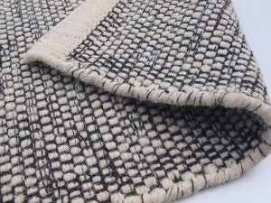 Rond wollen vloerkleed Anna zwart wit Mixed closeup