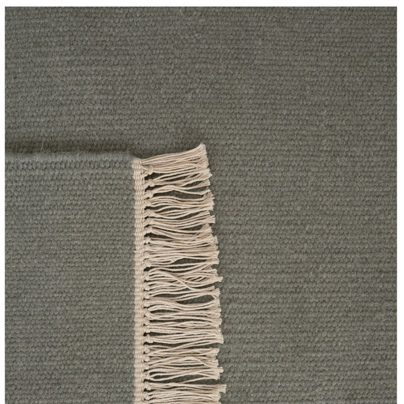 Wollen vloerkleed hip met flosjes Robijn Cactus detail