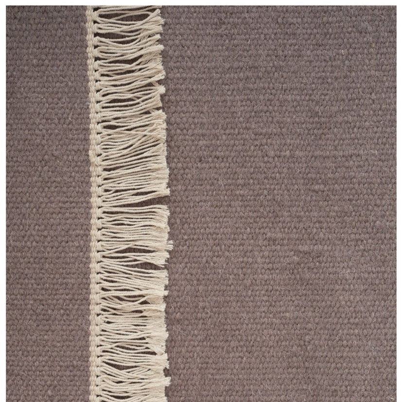 Wollen vloerkleed hip met flosjes Robijn Heather detail