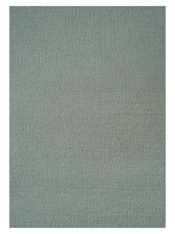 Wollen vloerkleed hip met flosjes Robijn Sky closeup