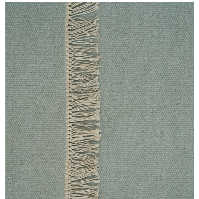 Wollen vloerkleed hip met flosjes Robijn Sky detail