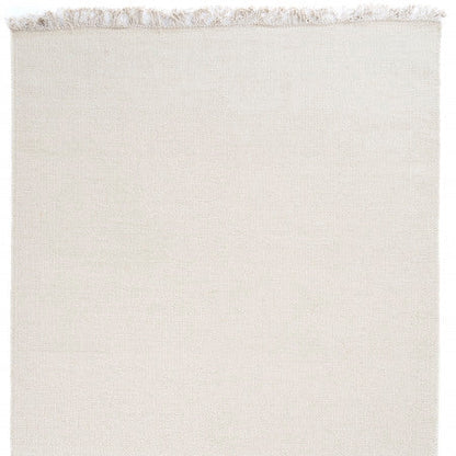 Wollen vloerkleed hip met flosjes Robijn White